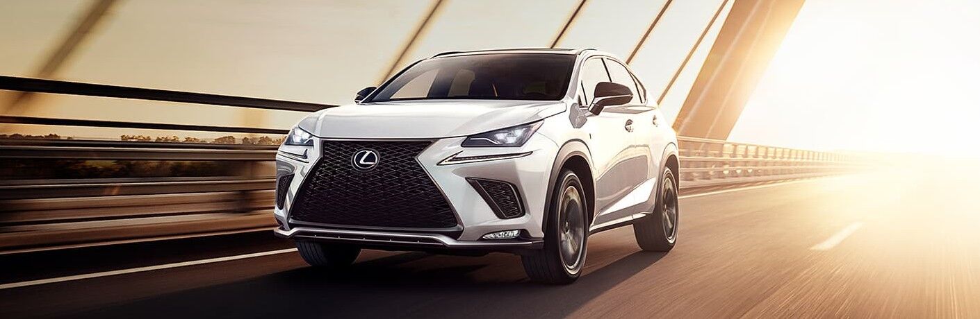 Front driver angle of a white 2021 Lexus NS