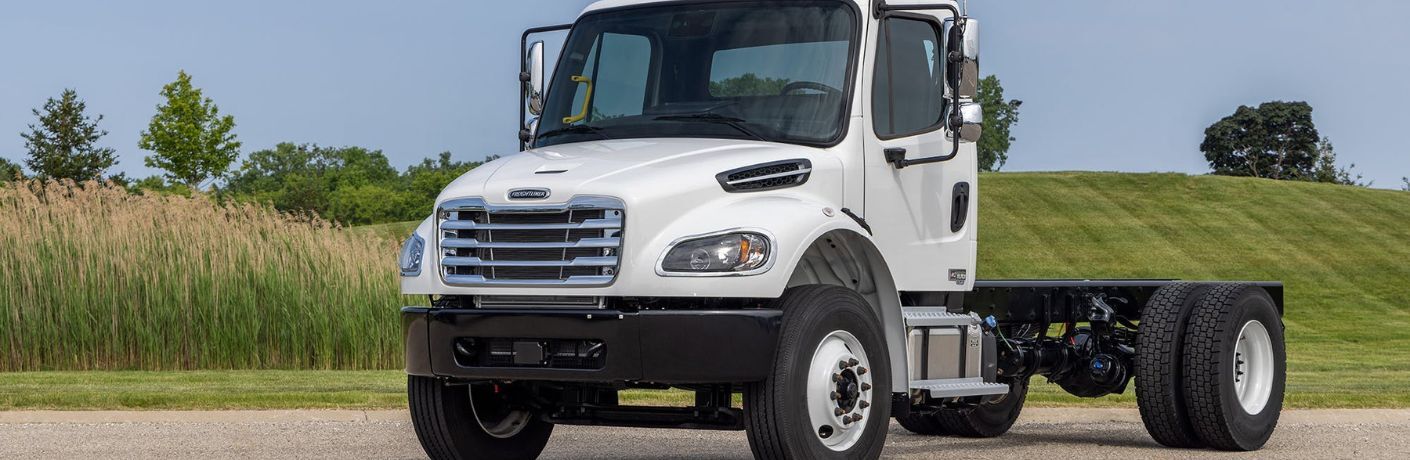 A used Freightliner M2 106 on road