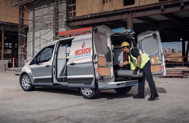 2024 Ford Transit Connect with a worker at a work site