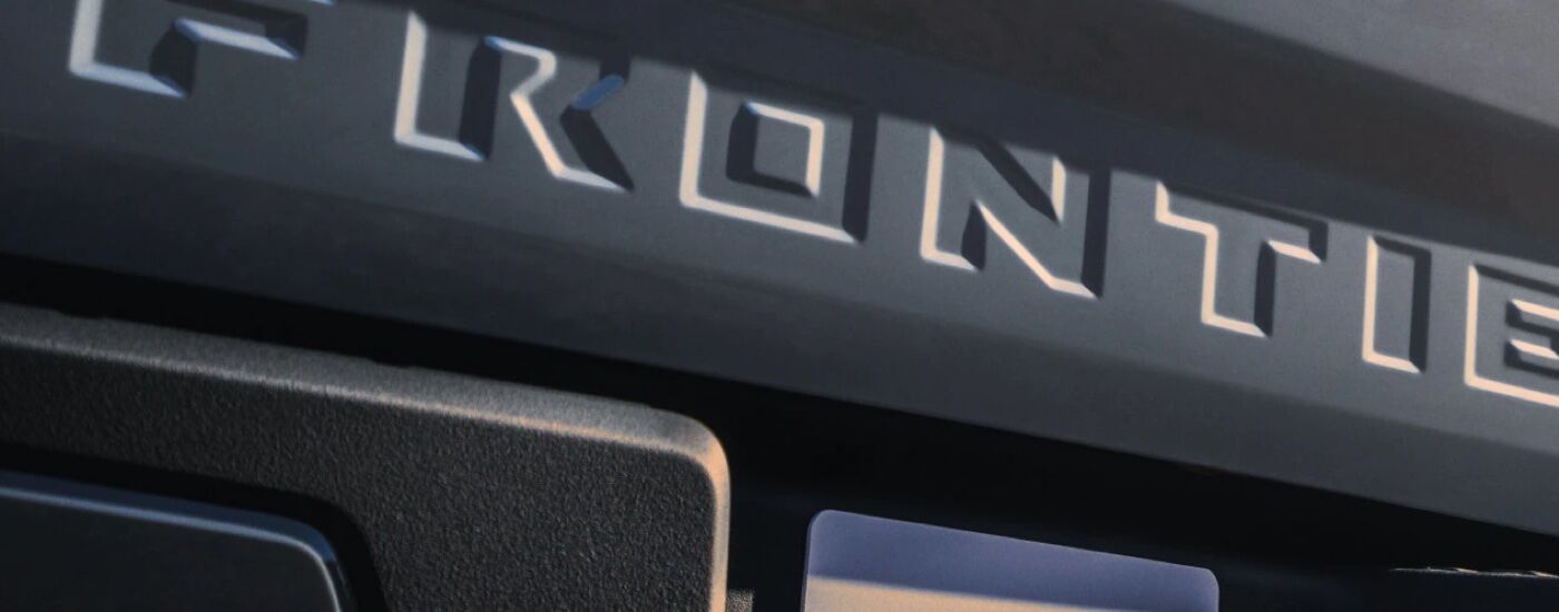 Grey liftgate on a grey used 2022 Nissan Frontier for sale