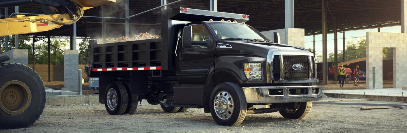 2025 Ford Medium Duty side view with a custom bed