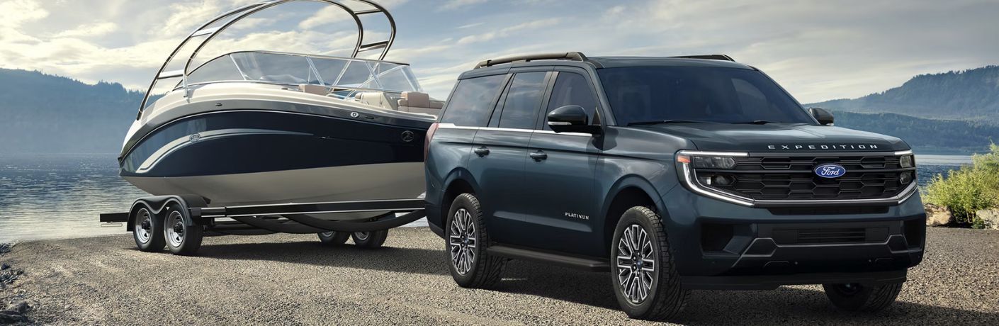 2027 Ford Expedition Max towing a boat