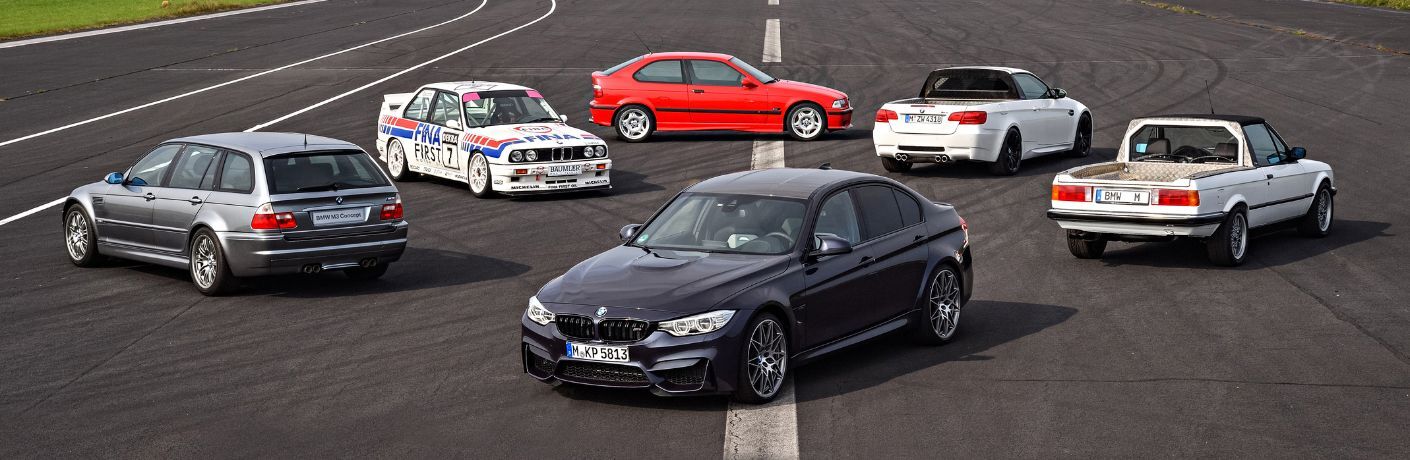 pre-owned BMW M3 models parked together