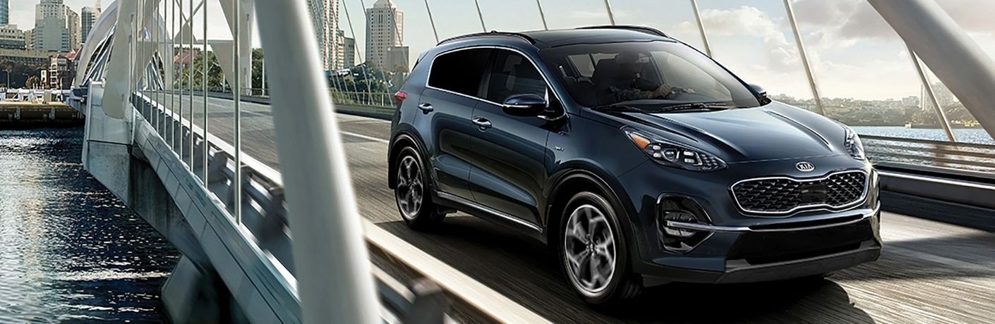 Exterior view of a blue 2021 Kia Sportage