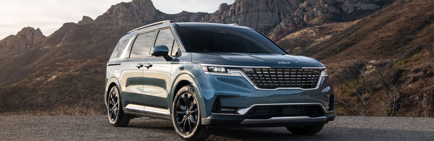 2024 Kia Carnival parked off-road