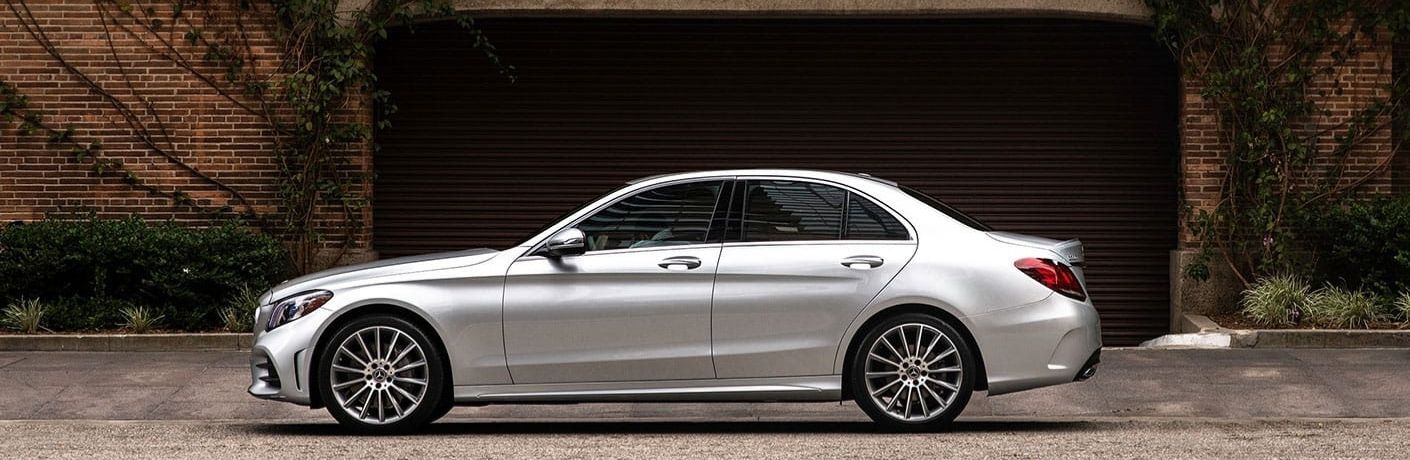Mercedes-Benz C-Class Mojave Silver Metallic parked on the side of the road