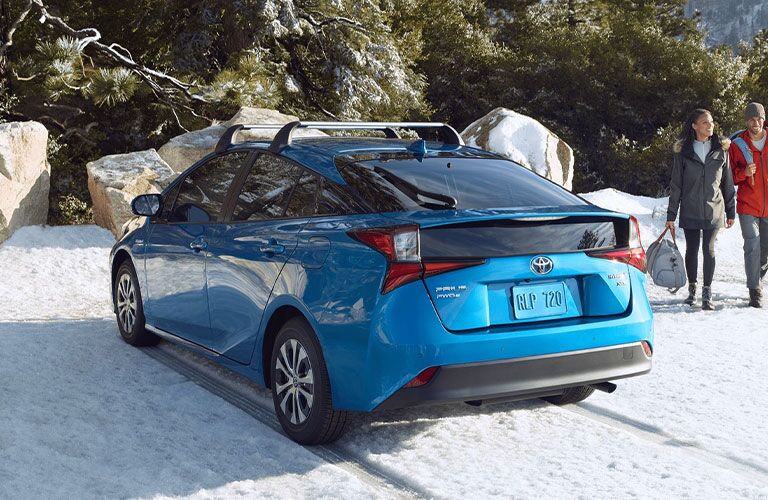 2021 Toyota Prius blue back view in snow