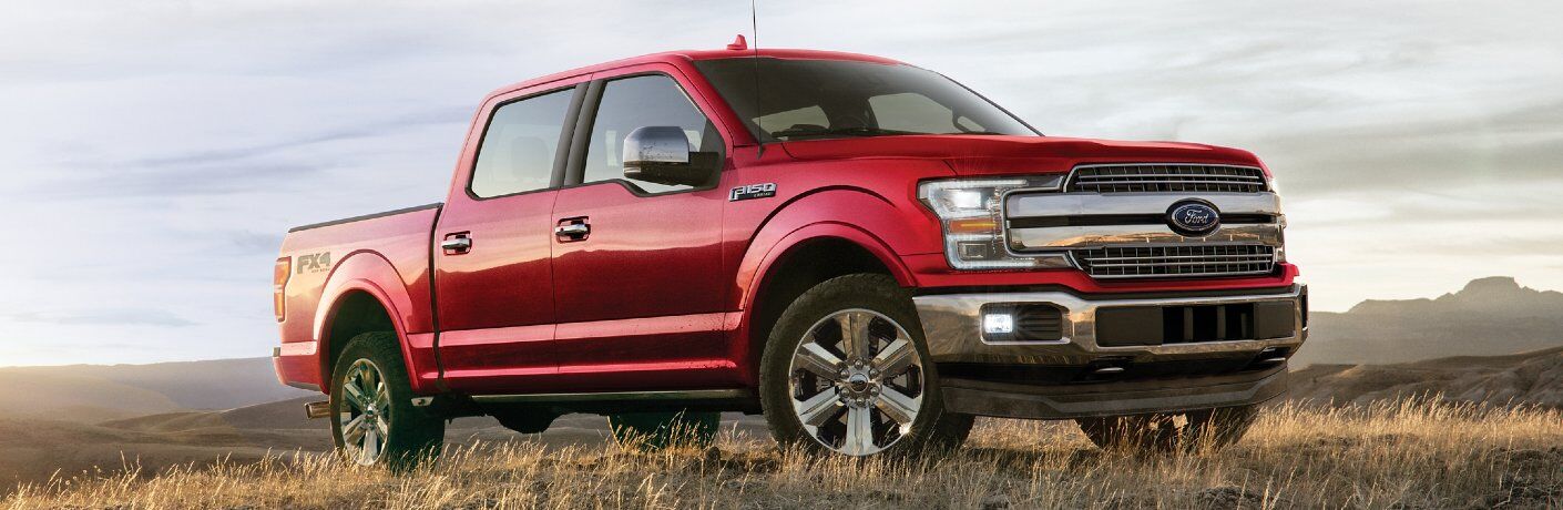 Red 2020 Ford F-150 parked off-road