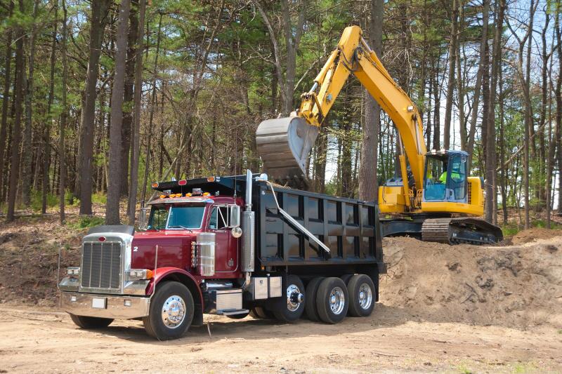 A pre-owned dump truck