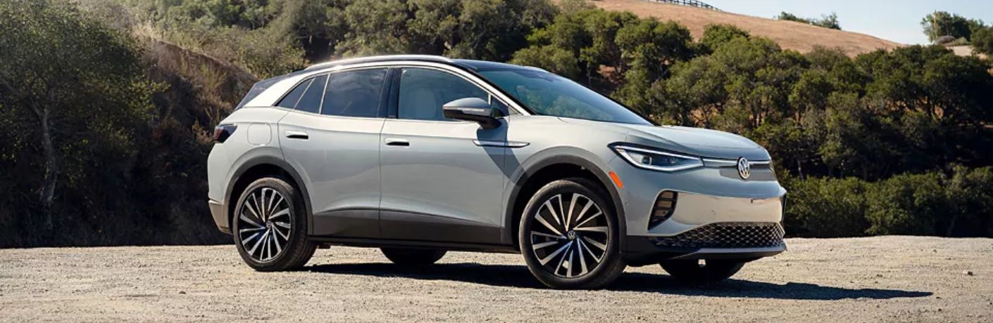 A 2023 Volkswagen ID.4 on a gritty terrain