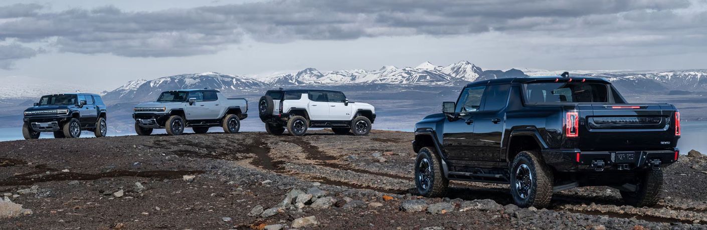 Several parked 2025 GMC Hummer EV SUV