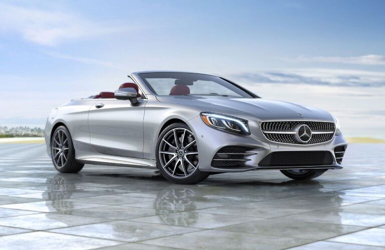 mercedes-benz s-class cabriolet parked outside on tile