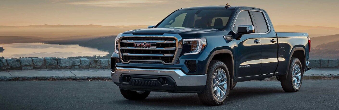 Front driver angle of a blue 2020 GMC Sierra 1500