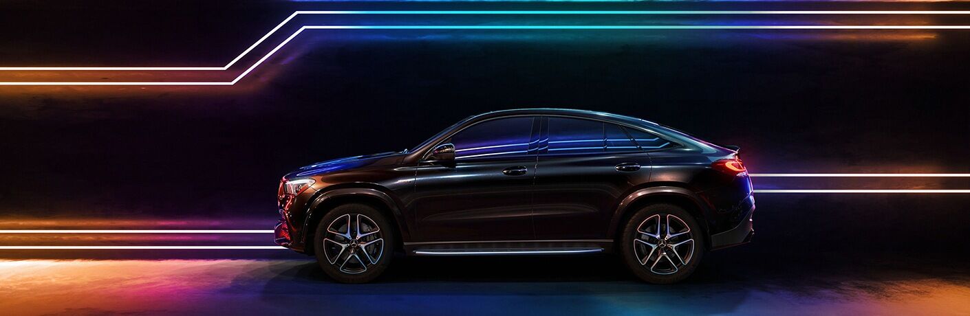 2022 Mercedes-AMG® GLE 53 Coupe black side view with neon lights