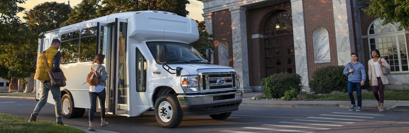 2024 Ford E-Series Cutaway parked on a road near a building