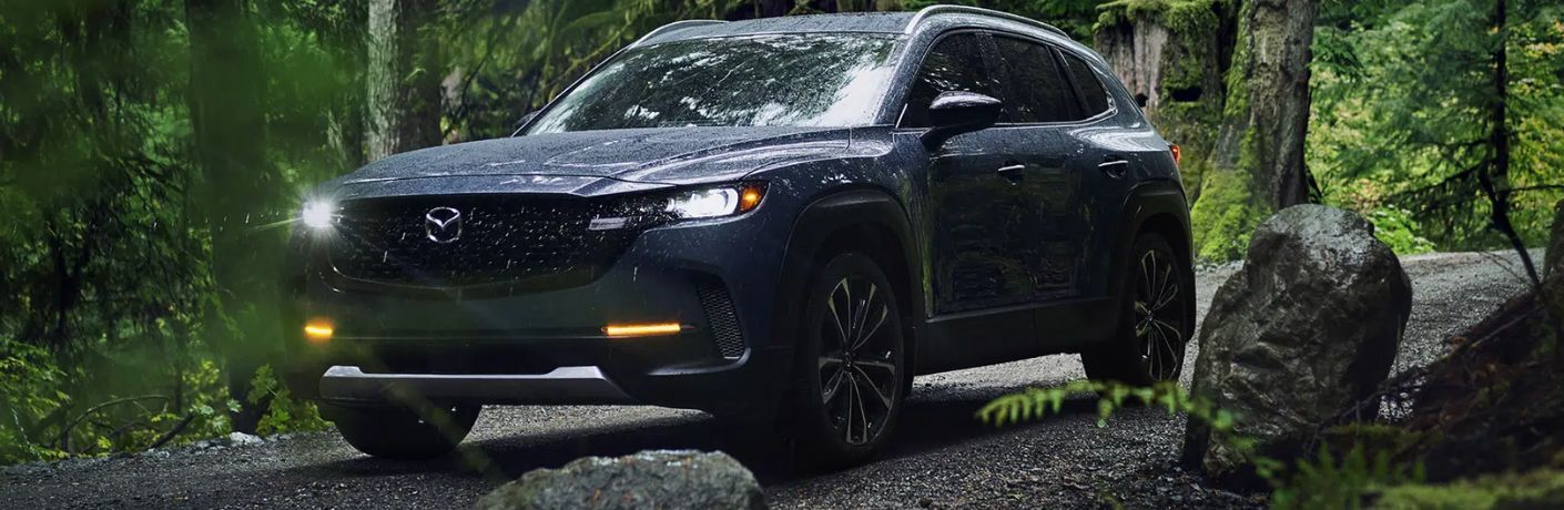 Front Quarter View of the 2024 Mazda CX-50 in the forest