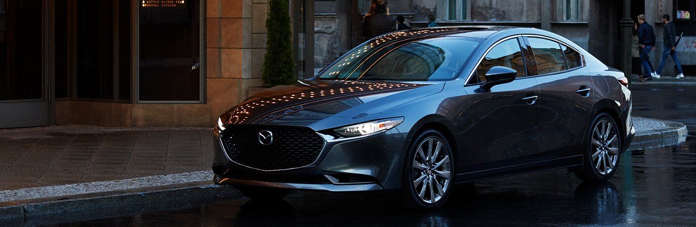 Front driver angle of a grey 2020 Mazda3 sedan