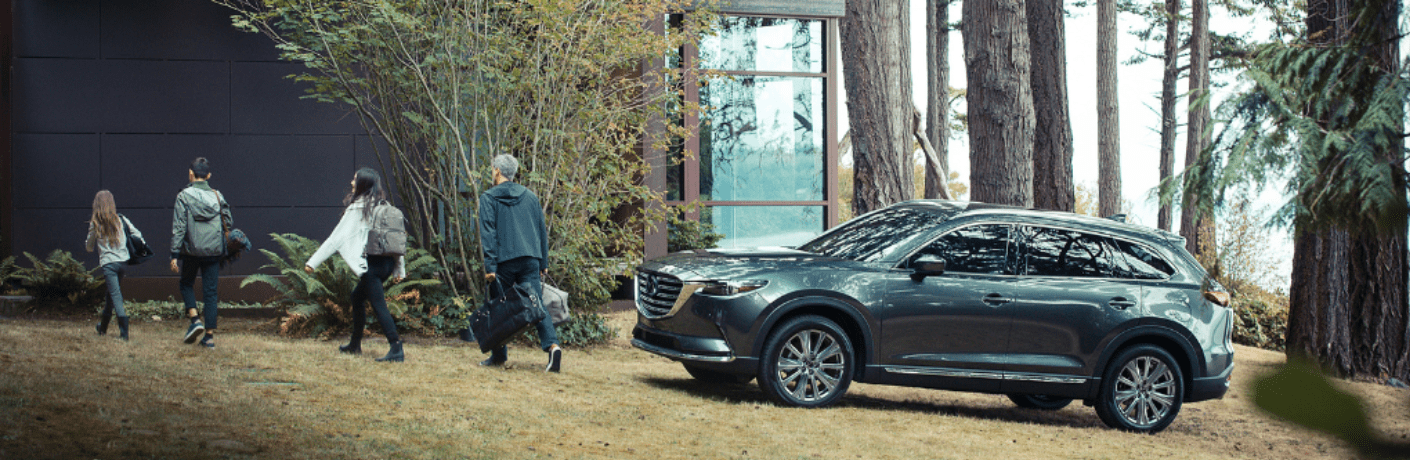 2023 Mazda CX-9 in front of a house