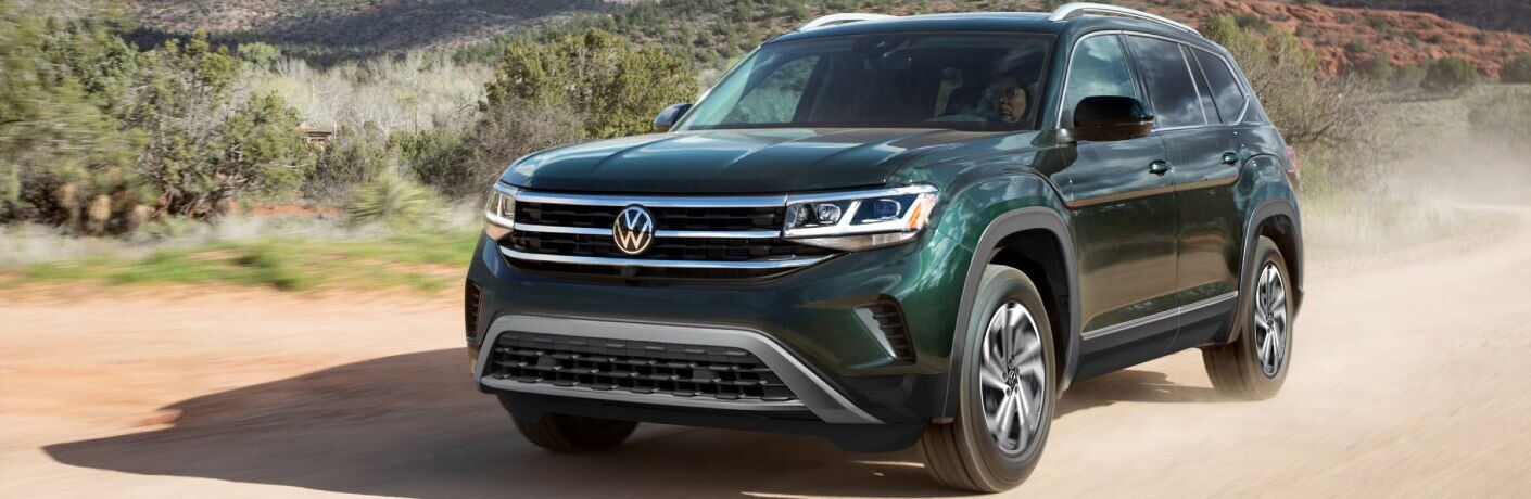 Front driver angle of a green 2022 Volkswagen Atlas