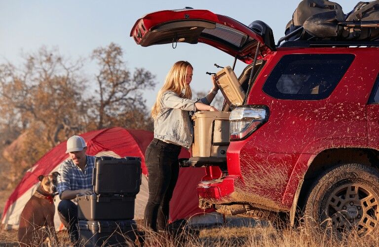 2021 Toyota 4Runner red being unloaded at tent site