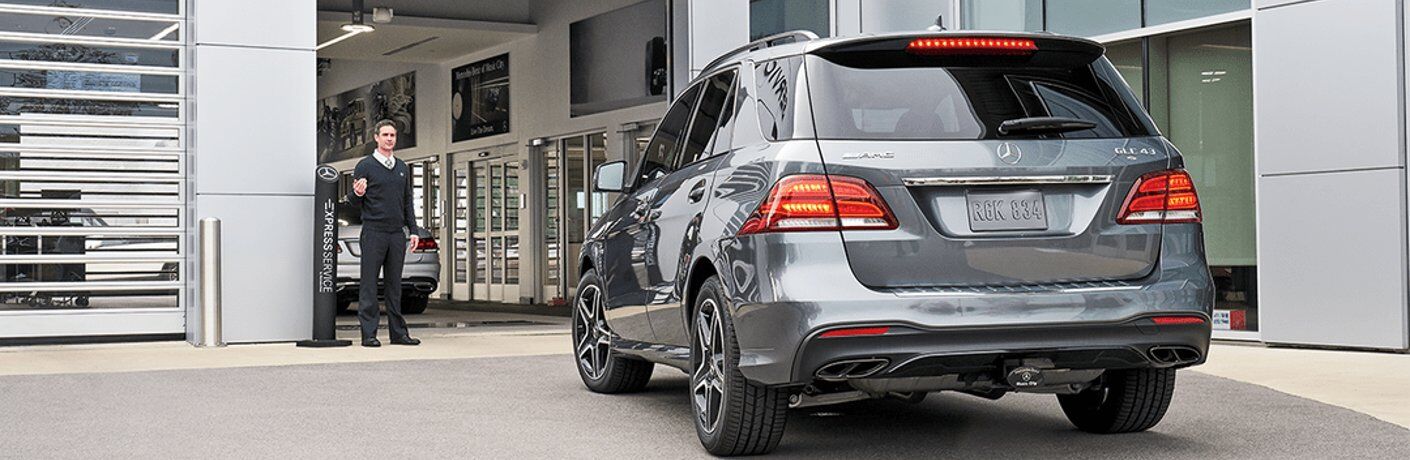 Mercedes vehicle pulling into service center
