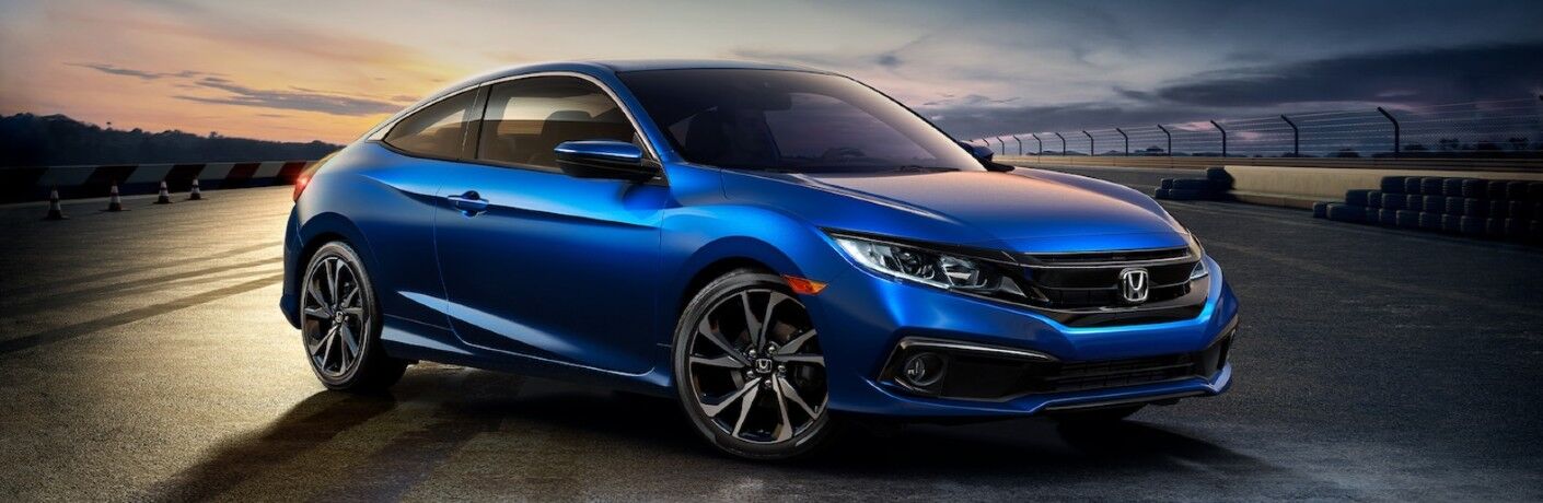 Front passenger angle of a blue 2020 Honda Civic Coupe