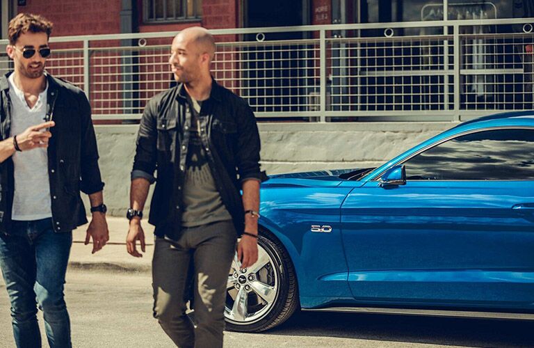 2021 Ford Mustang GT with two men