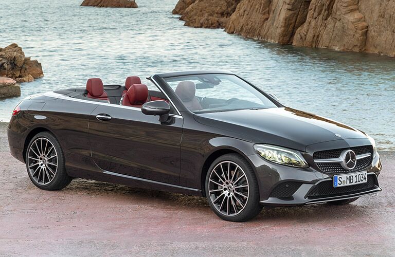 mercedes-benz c-class cabriolet parked by the water