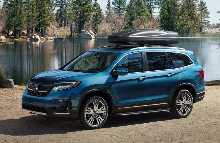Front driver angle of a blue 2020 Honda Pilot
