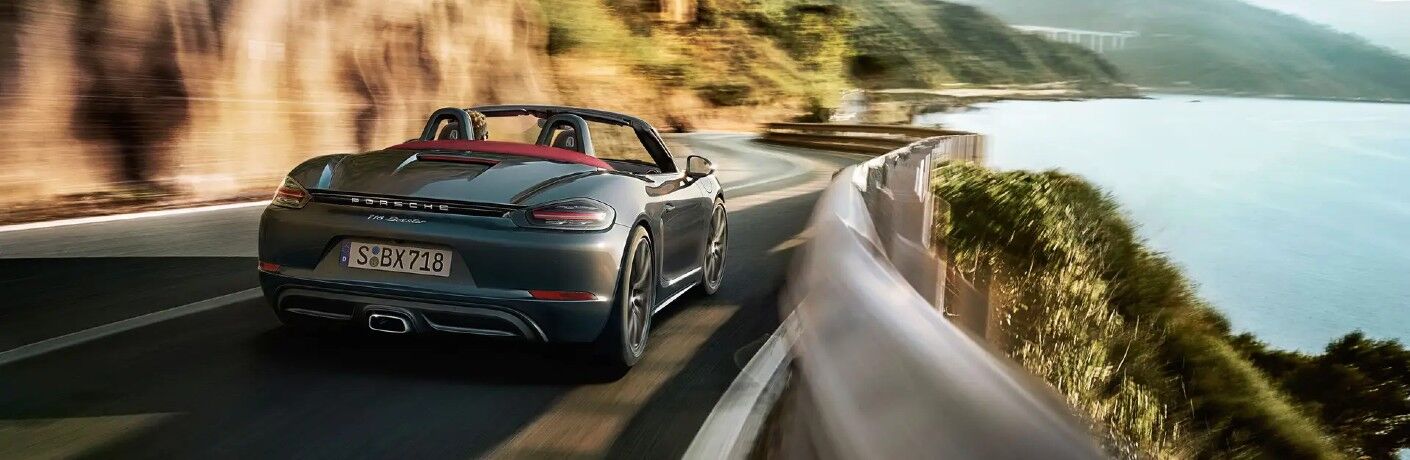 2021 718 Boxster driving along the cost