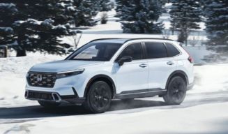 2024 Honda CR-V Hybrid driving on snow