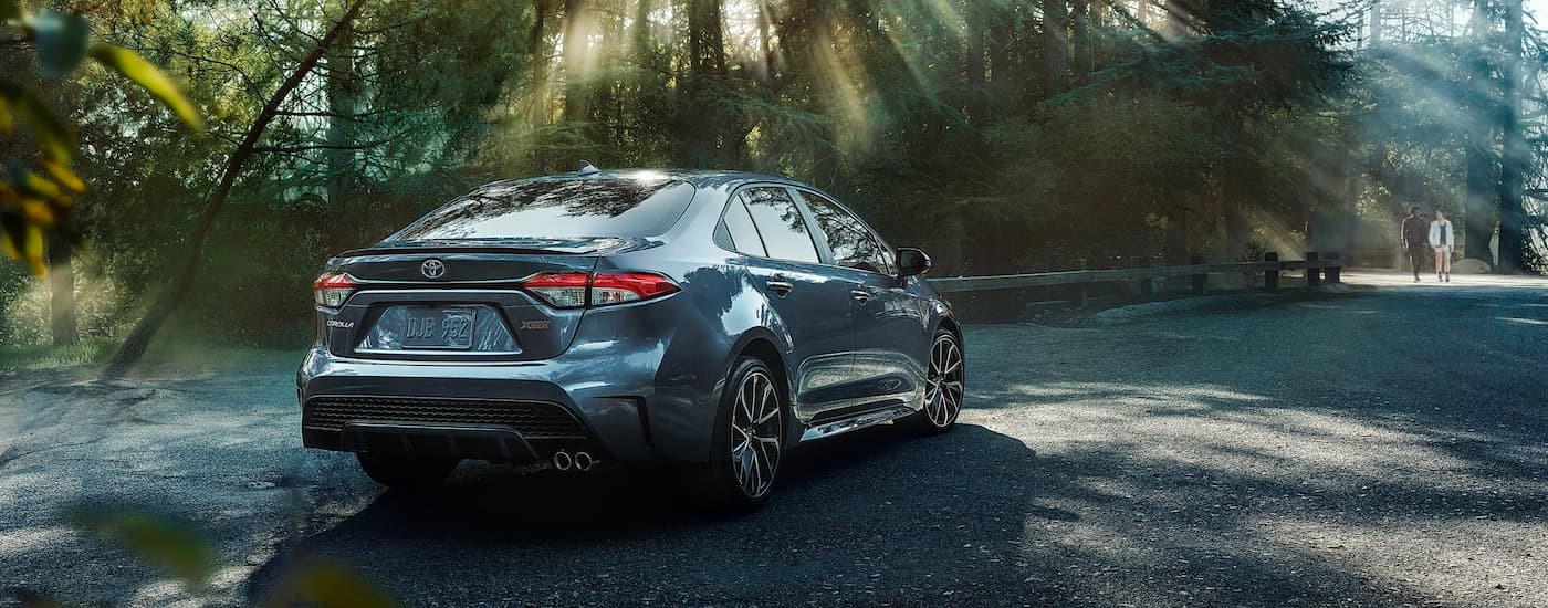 Silver 2020 Toyota Corolla XSE parked on a road.