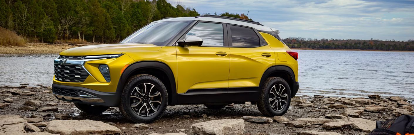 side view of the 2025 Chevrolet Trailblazer near a lake