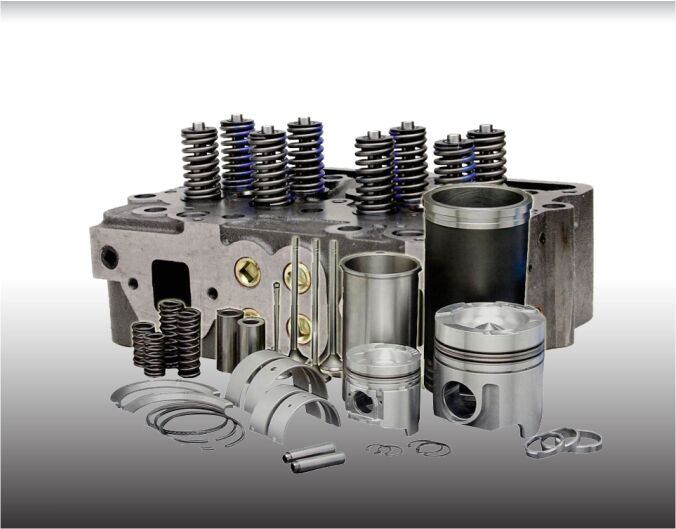 A man performing service on a Cummins commercial truck engine