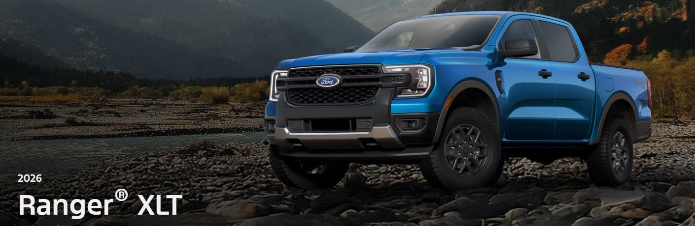 2026 Ford Ranger XLT side and front view on rocks