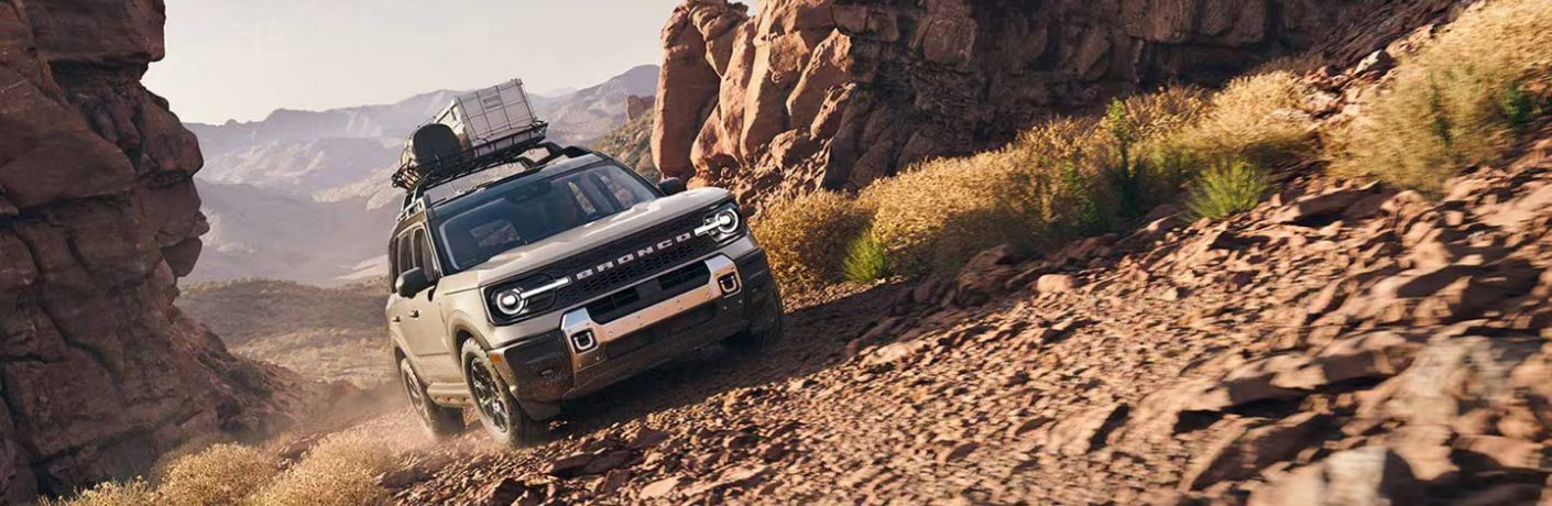 2025 Ford Bronco Sport Badlands driving up an incline