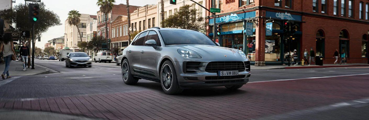 2021 Macan driving through intersection