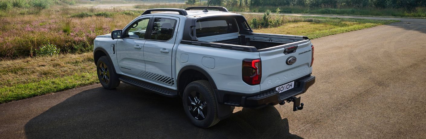 2025 Ford Ranger PHEV rear view parked on a road