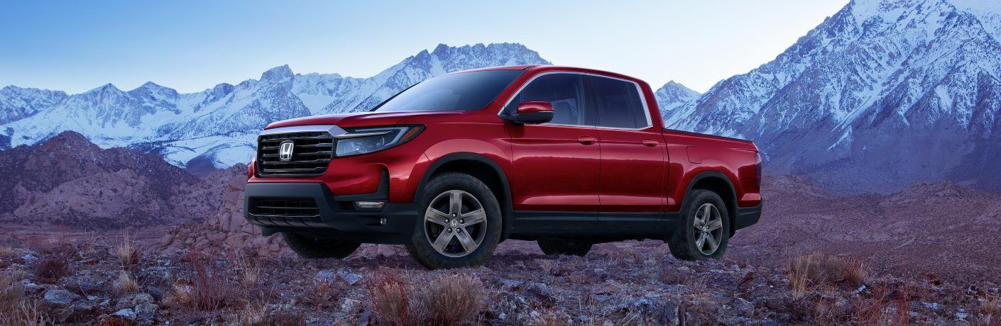 2021 Ridgeline in front of mountains