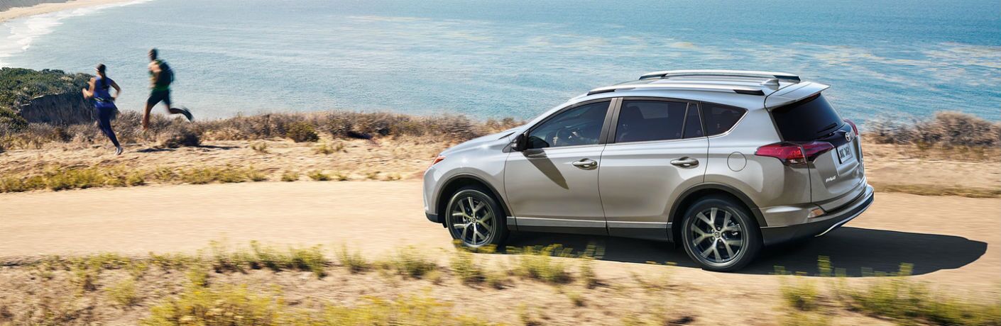 Silver-colored Toyota RAV4 at the beach