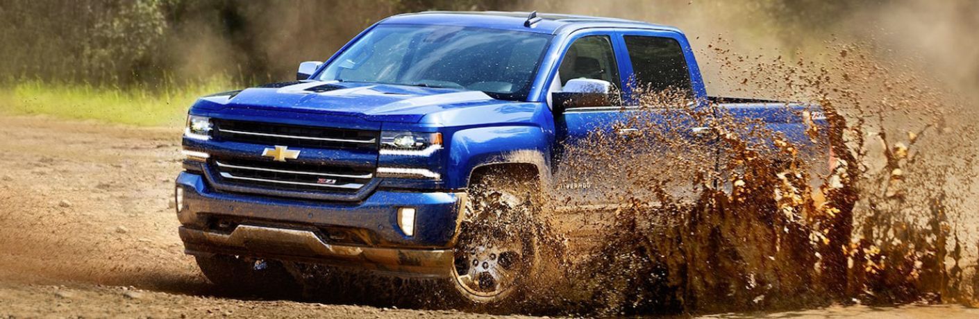 Side view of the 2018 Chevrolet Silverado in the mud