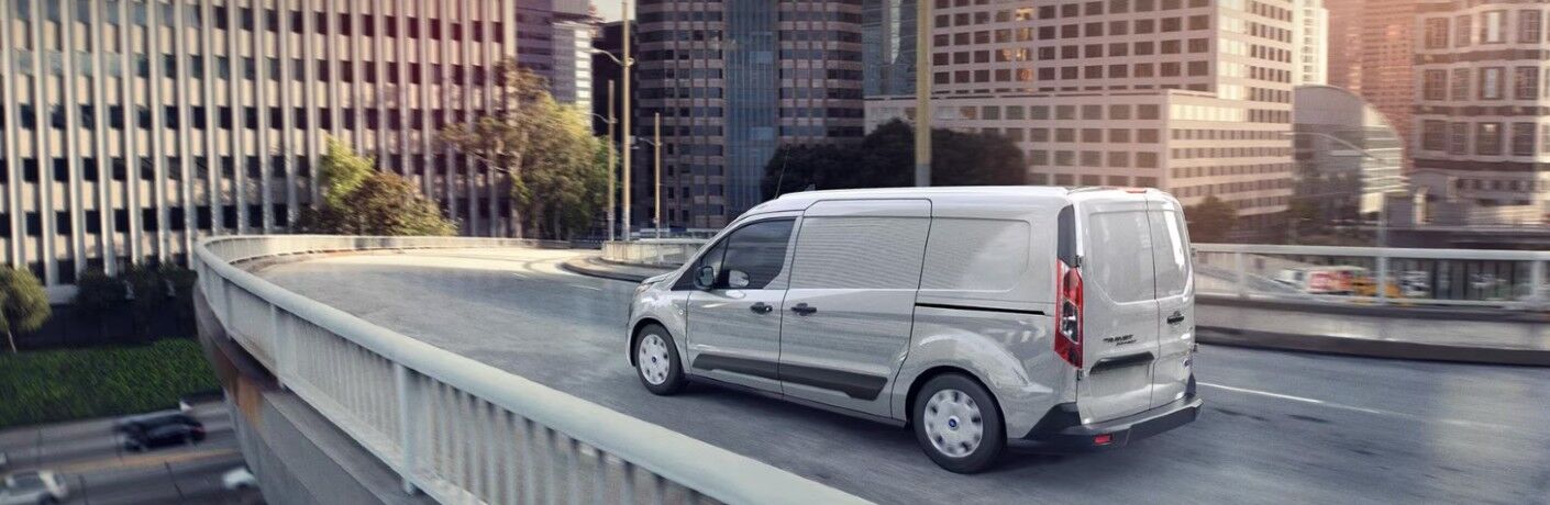 2024 Ford Transit Connect driving in a city
