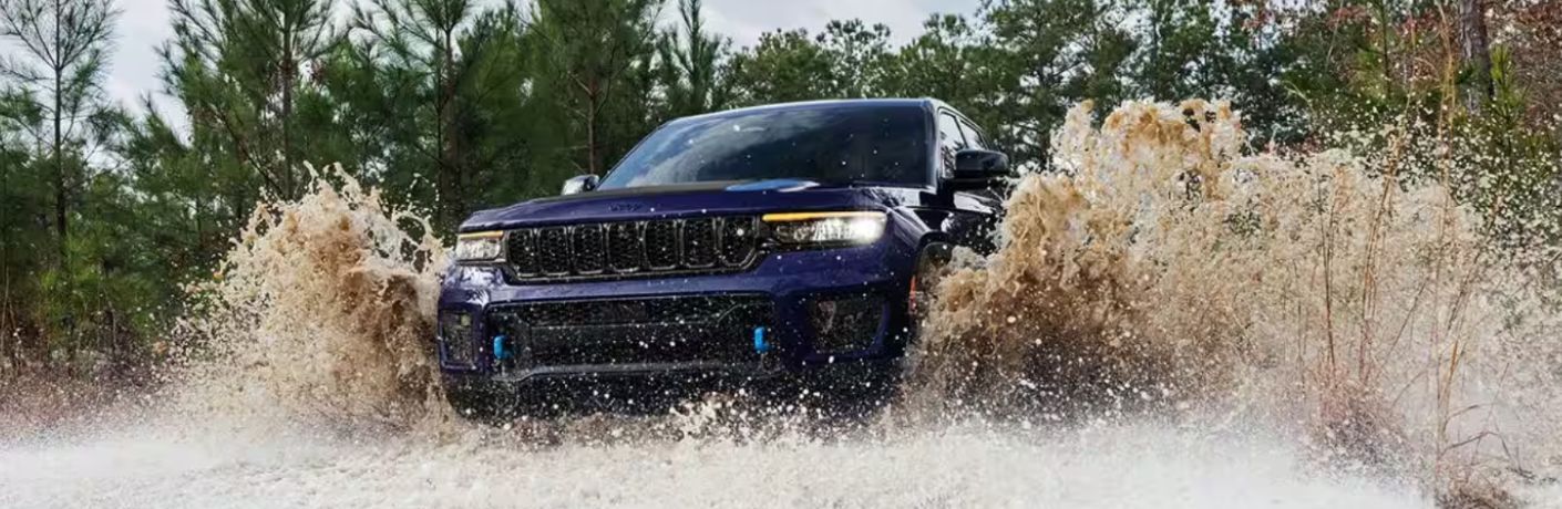 2024 Jeep Grand Cherokee on a watery terrain