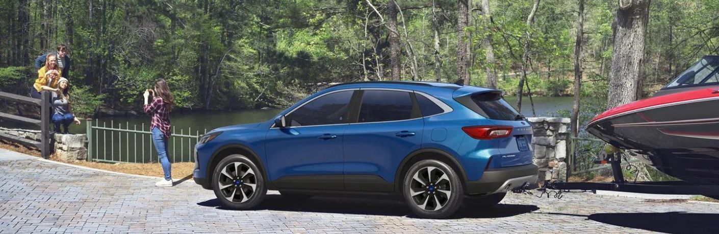 2023 Ford Escape towing a boat