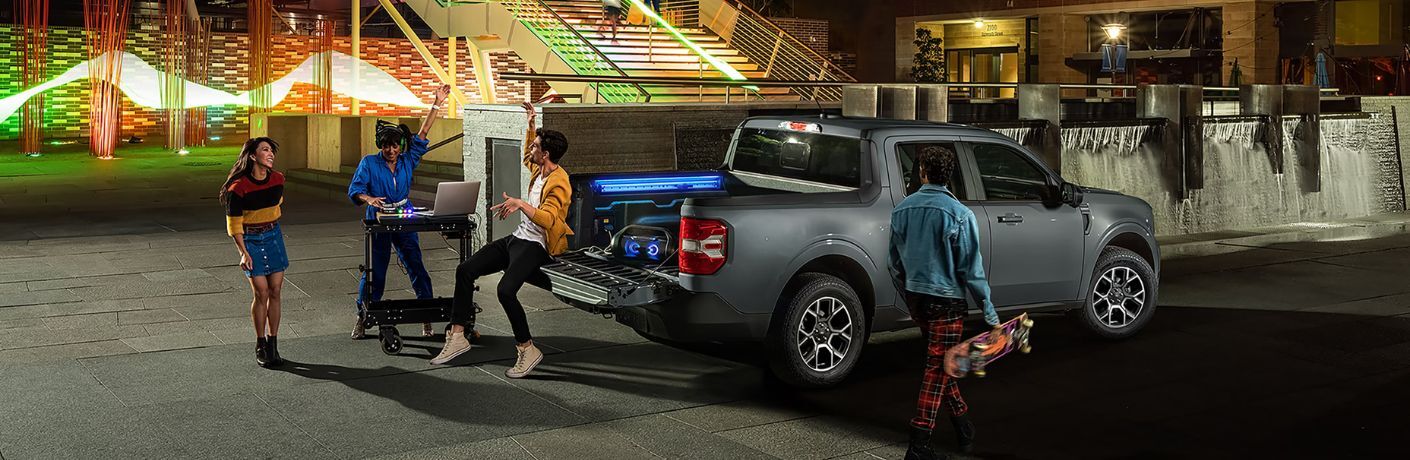 2026 Ford Maverick rear view at a carnival