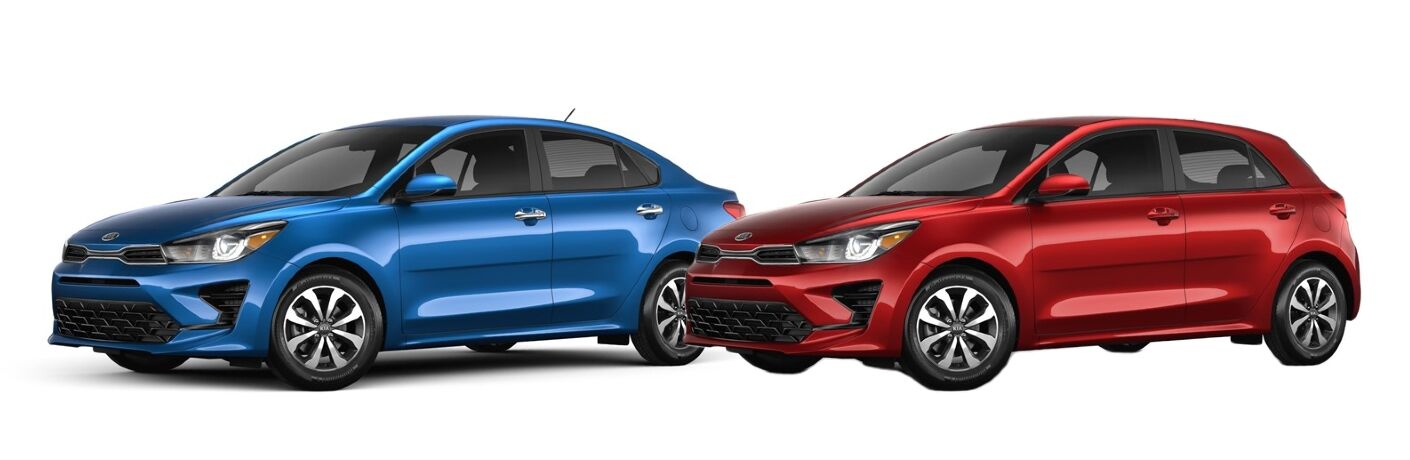 Two 2021 Kia Rio sedans parked next to each other