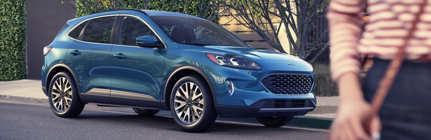 Blue 2020 Ford Escape SEL parked on city curb