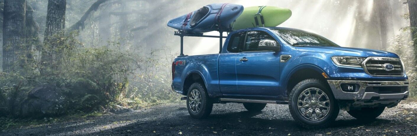Blue 2019 Ford Ranger Lariat parked in forest