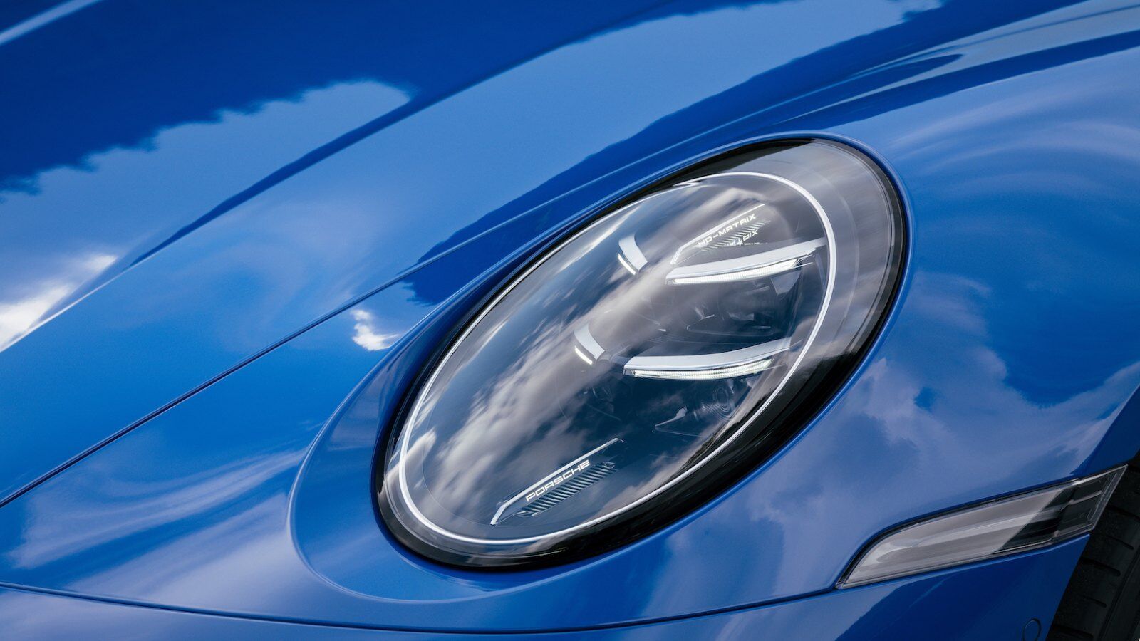 Porsche 911 front wheel and suspension detail – Champion Porsche Pompano Beach, FL
