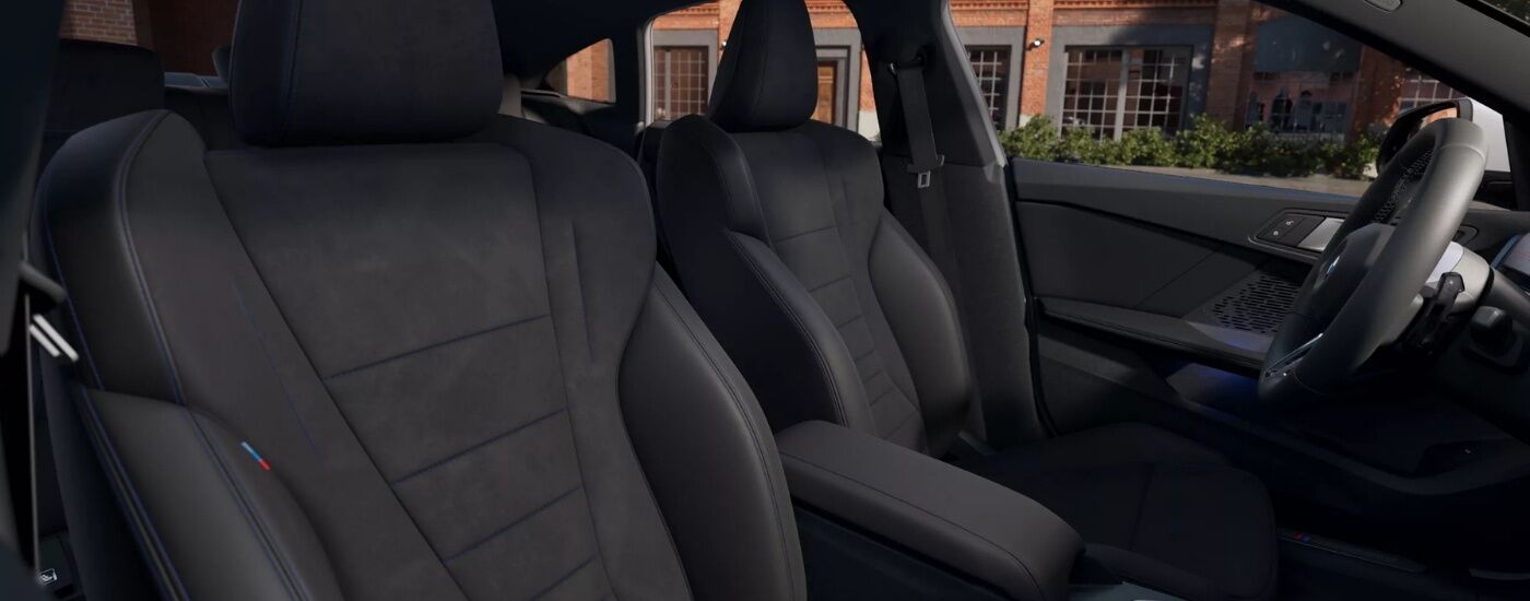 Front seats and center console in a 2025 BMW 2 Series Gran Coupe